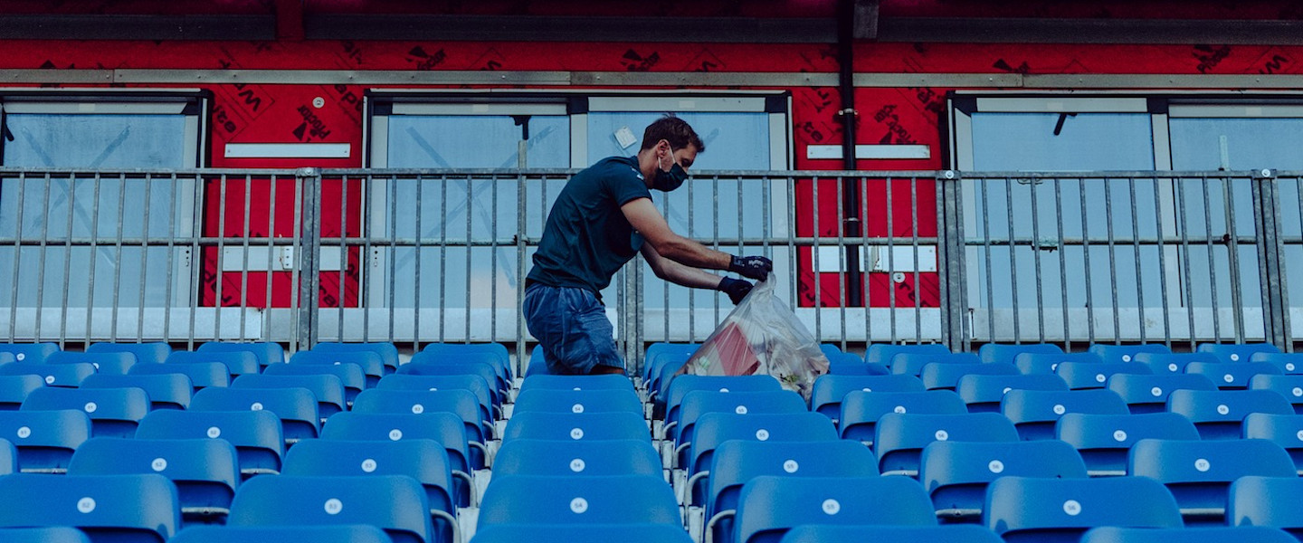 Sebastian picks up litter following the British Grand Prix