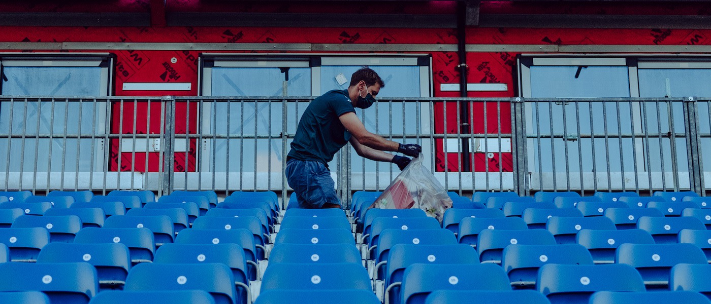 Sebastian picks up litter following the British Grand Prix