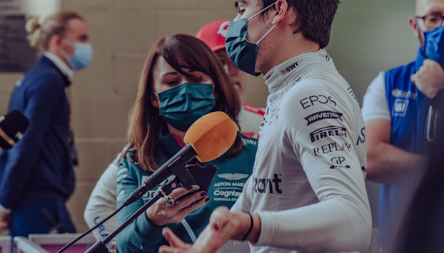 Senior Media Officer, Joanne Revill, with Lance Stroll