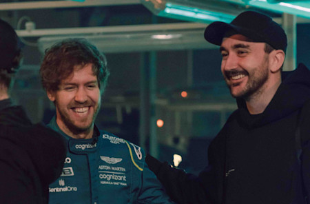 Sebastian Vettel shares a laugh with photographer Conor McDonnell