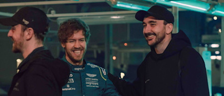Sebastian Vettel shares a laugh with photographer Conor McDonnell 