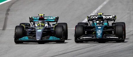 Sebastian goes wheel-to-wheel with Lewis Hamilton into Turn One