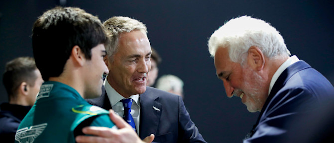 Lawrence and Lance Stroll and Martin Whitmarsh share a laugh ahead of the AMR22's reveal