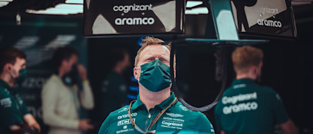 A team member keeps up with progress on track