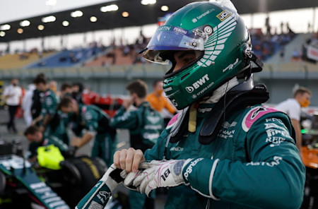 Lance puts on his gloves before getting into the driver's seat for the race.