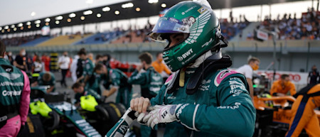 Lance puts on his gloves before getting into the driver's seat for the race.