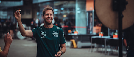 Seb takes on a different challenge in the Interlagos paddock, trying his hand at darts.