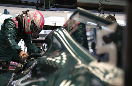 Sebastian climbs into the AMR21 for FP1