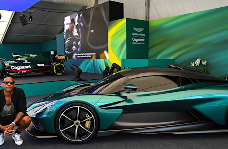 TV Presenter Reggie Yates poses with the Aston Martin Valhalla