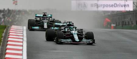 Lance fends off Lewis Hamilton during the opening stint of the race