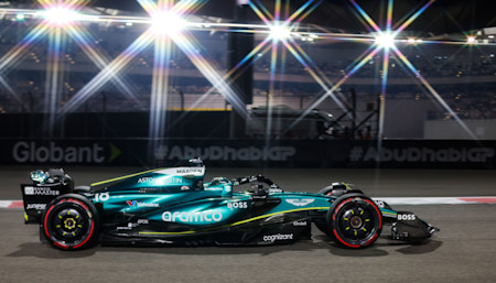Lance driving down one of the circuit's back straights