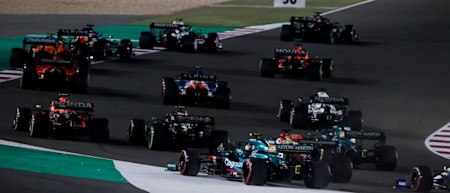 Lights out: Sebastian and Lance go wheel-to-wheel with their rivals at the start of the 2021 Qatar Grand Prix.