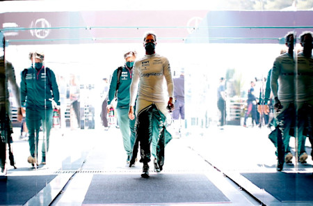 Sebastian enters the garage on race day