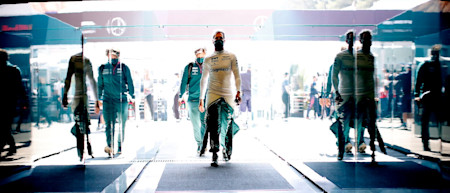 Sebastian enters the garage on race day