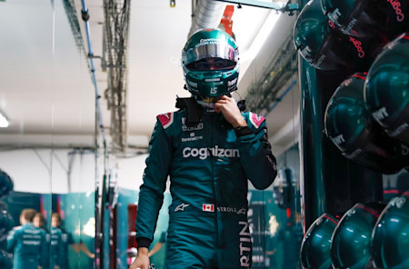 Lance gets ready to jump into the AMR21 for qualifying