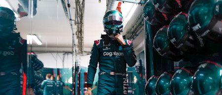 Lance gets ready to jump into the AMR21 for qualifying