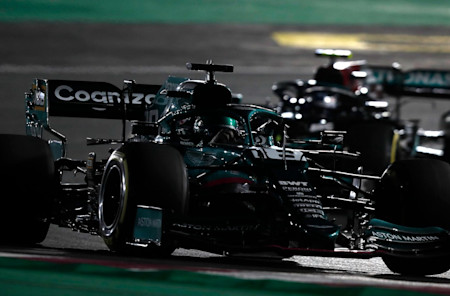 Lance expertly fends off Valtteri Bottas.
