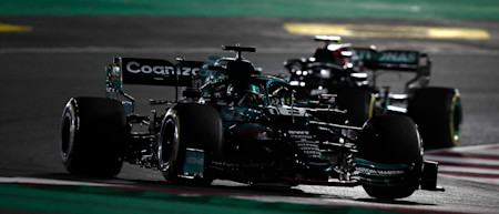 Lance expertly fends off Valtteri Bottas.