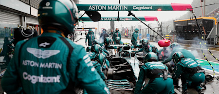 A team member watches on during pitstop practice