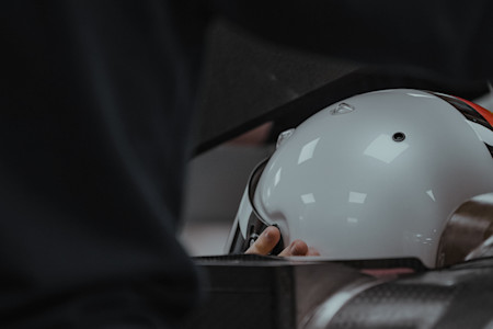 Sebastian Vettel undergoes his seat fitting