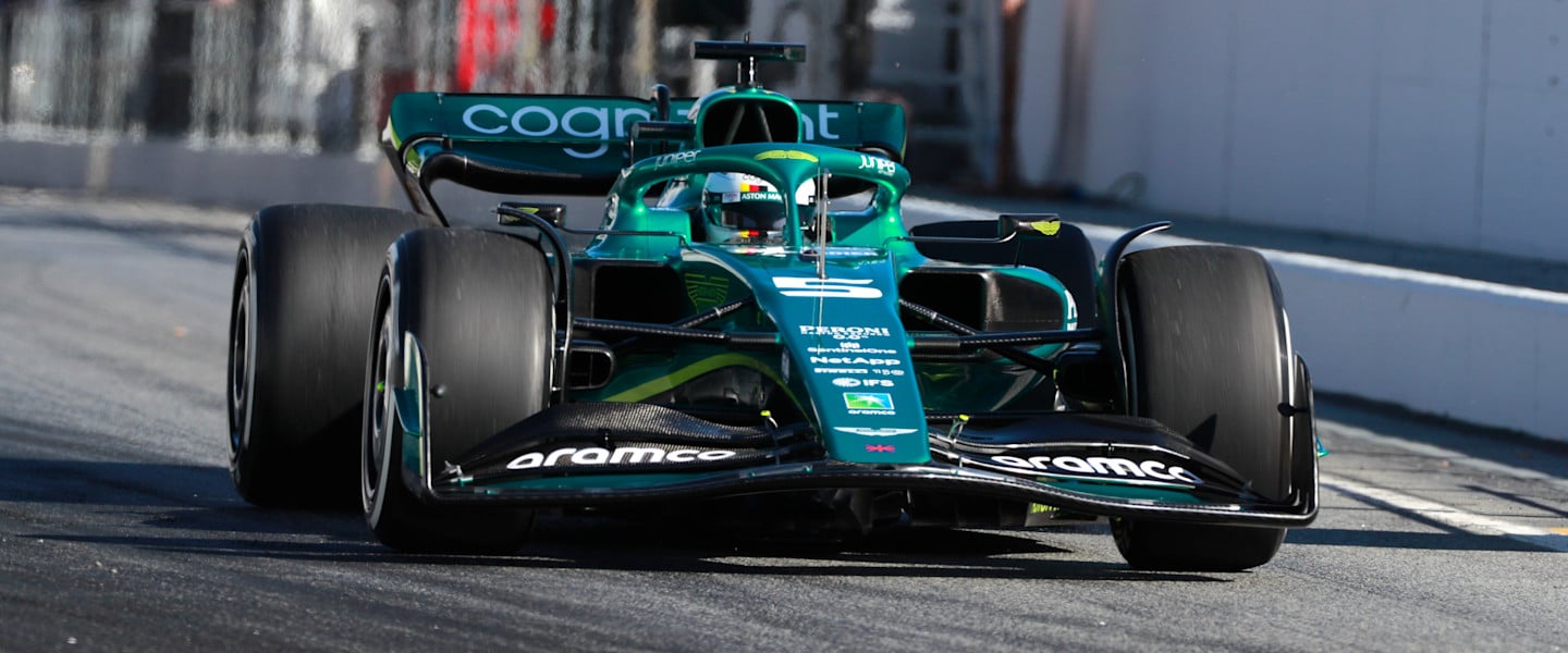 The AMR22 heads down the Barcelona pitlane