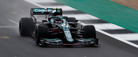 Sebastian drives the damp Silverstone circuit