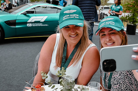 Fans take a selfie with the Aston Martin Vantage Safety Car