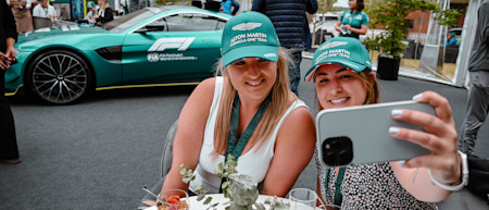 Fans take a selfie with the Aston Martin Vantage Safety Car