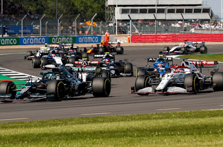 Lance battles his way through the midfield in the British Grand Prix