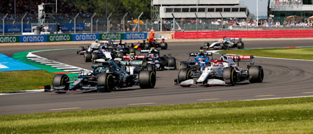 Lance battles his way through the midfield in the British Grand Prix