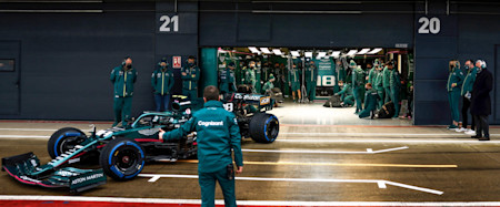 The team watches on as the AMR21 takes to the track