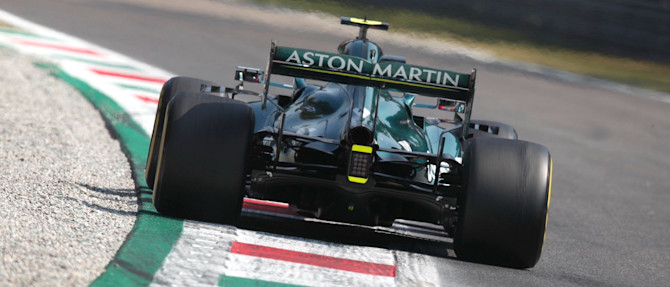 The AMR21 rides the kerbs at Monza