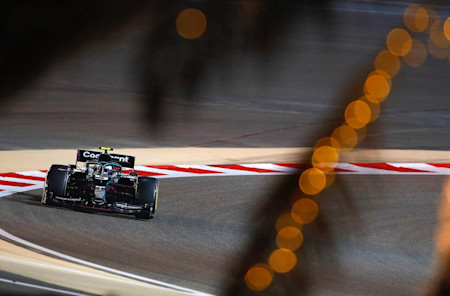 Sebastian Vettel drives the AMR21 under the lights in Bahrain