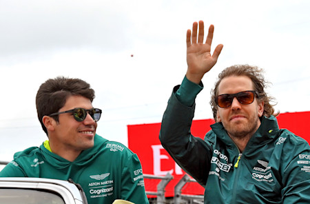 Lance and Sebastian show their appreciation for the fans on the drivers' parade.
