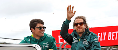 Lance and Sebastian show their appreciation for the fans on the drivers' parade.