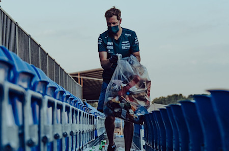 Sebastian picks litter following the British Grand Prix on Sunday