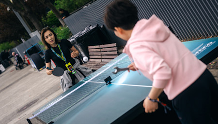 Speed skater Ahenaer Adake was among those to take on Deng Yaping in the table tennis challenge