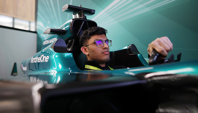 At our Drive to Survive watch party, I / AM members had the opportunity to get behind the wheel of our bespoke gaming simulator