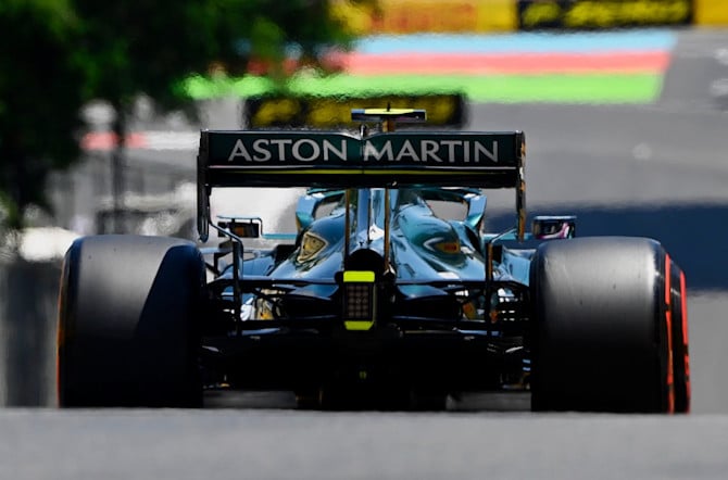 The AMR21 heads down to Turn 16 ahead of the 2km main 'straight'.