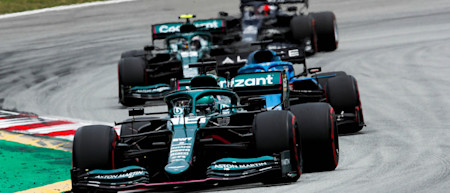 Lance and Sebastian battle in the midfield during the Spanish Grand Prix