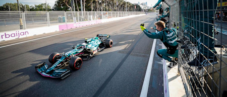 The team celebrates as Sebastian crosses the line in second place