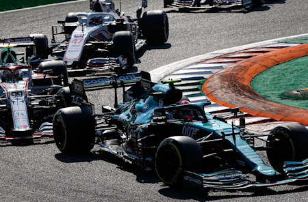 Sebastian navigates the opening chicane during the Grand Prix