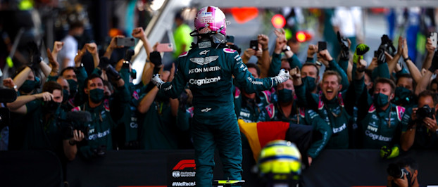 Sebastian celebrates Aston Martin's first podium with the team