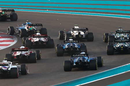 The Abu Dhabi Grand Prix is go as Sebastian and Lance battle into Turn One