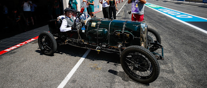 Sebastian heads out onto the circuit with Johnny Herbert as riding mechanic.