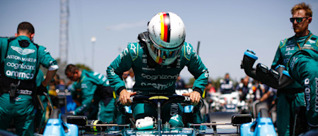 Ready to race: Sebastian climbs into the car ahead of the Spanish Grand Prix