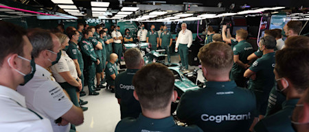 Executive Chairman Lawrence Stroll delivers a speech thanking the team for their hard work