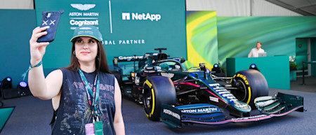 A fan takes a selfie with the AMR21