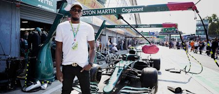 REPLAY Ambassador Usain Bolt with the AMR21 