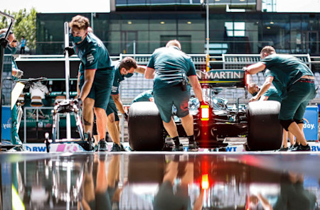 Seeing double: Mechanics bring the AMR21 into the garage